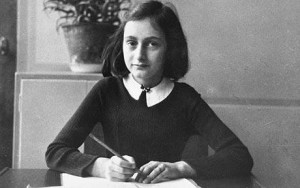Anne Frank at her desk